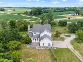Sprawling 10-Acre Fixer with Pond and Potential