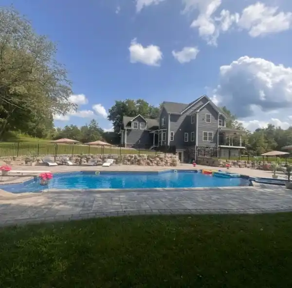 GRAND CUSTOM COLONIAL WITH RESORT STYLE AMENITIES