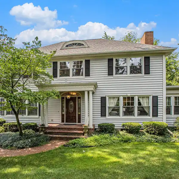 SECLUDED ESTATE SURROUNDED BY MANICURED GARDENS