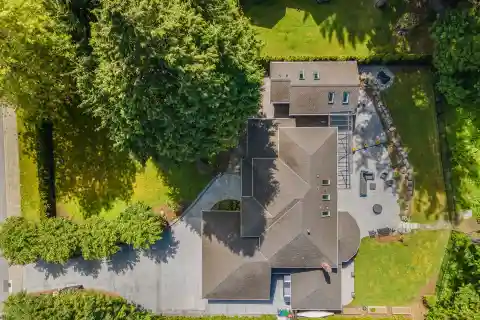 Elegant Estate with Serene Creekside Backyard