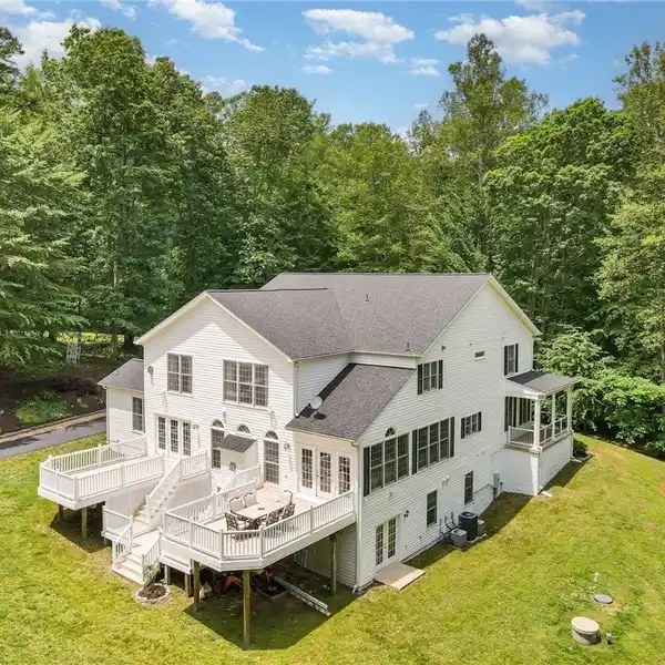 ELEGANT 11+ ACRE RETREAT WITH SPACIOUS DECK