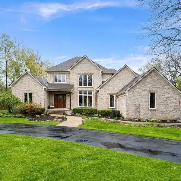 EXCEPTIONAL HOME ON PRIVATE WOODED PROPERTY