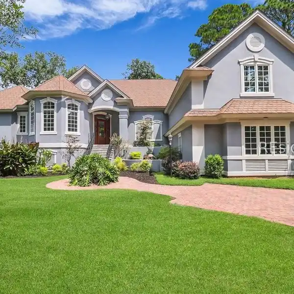 CUSTOM-BUILT FRENCH COUNTRY STYLE HOME