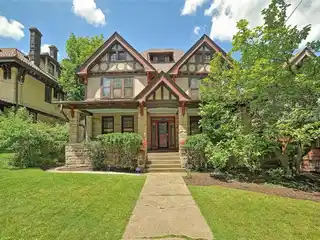 Stone & Stucco Tudor Residence