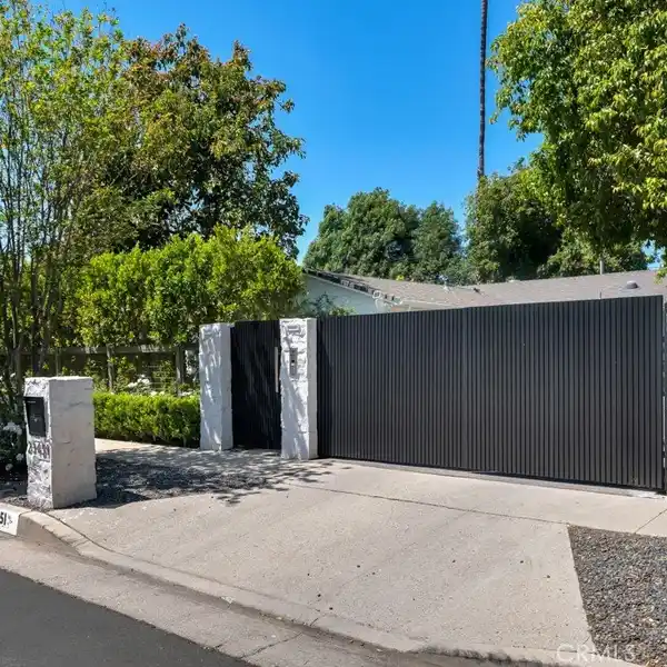 CHARMING HOME ON A BEAUTIFULLY LANDSCAPED LOT