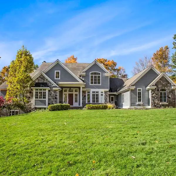 CUSTOM-BUILT THORNAPPLE RIVER HOME WITH POOL & PANORAMIC VIEWS