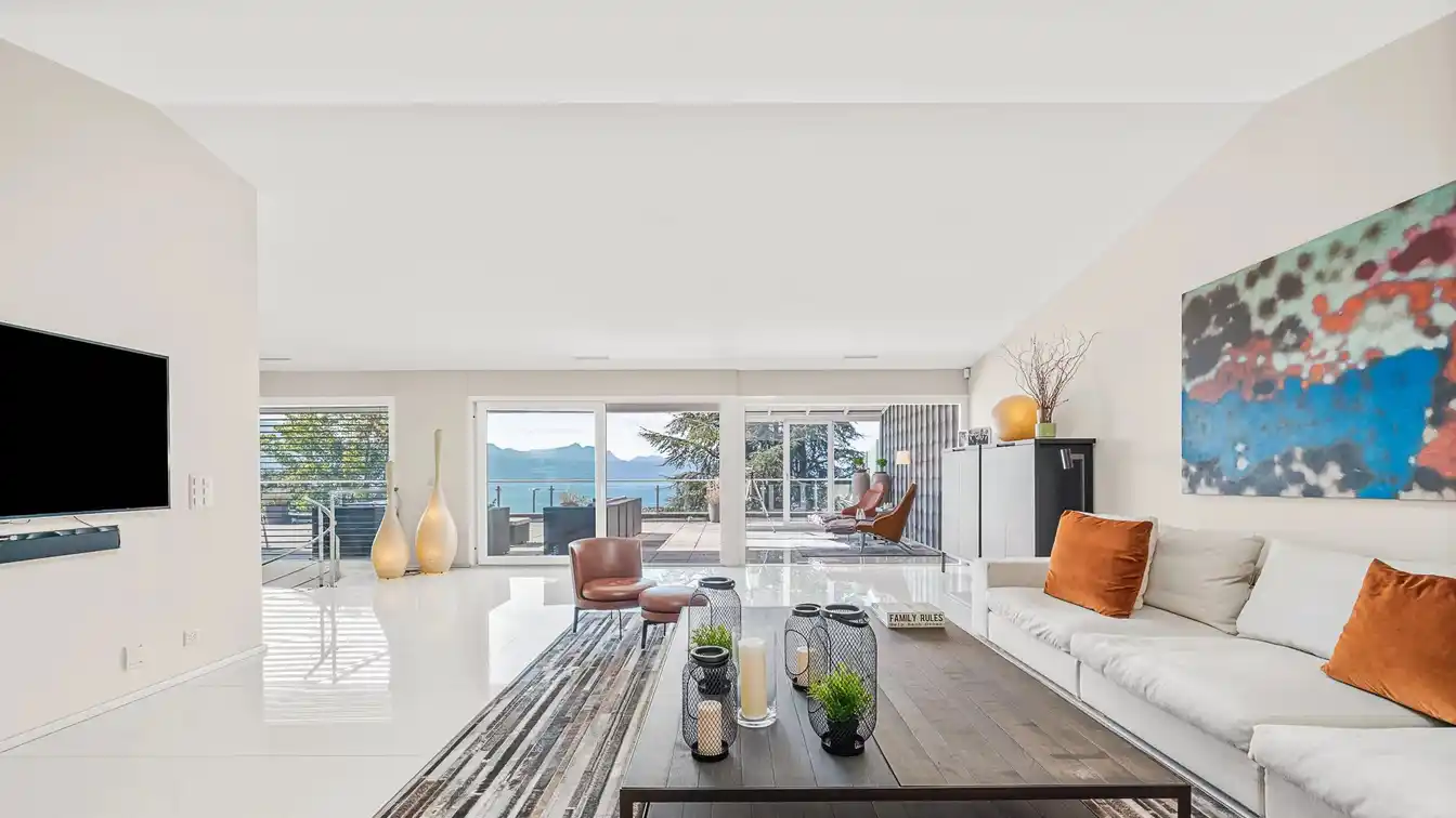 Stunning Duplex Penthouse with Breathtaking Lake Geneva Views