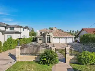 Exquisite Gated Estate in Prestigious Sherwood Forest