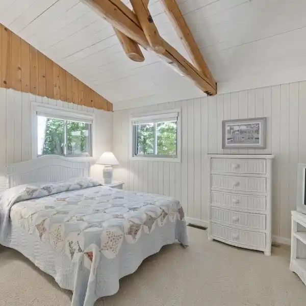 LAKEFRONT ELEGANCE WITH DOCKS, BEACH, AND VIEWS