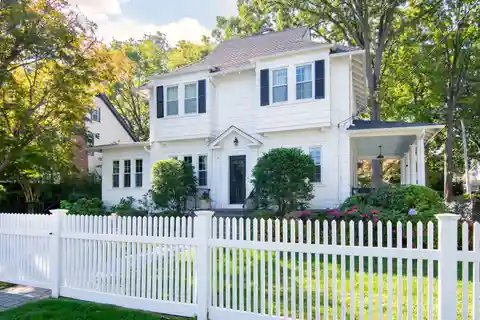 Stunning White Colonial Sits on Beautiful Corner Lot