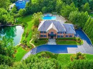 One-of-a-kind Kings Point Center Hall Colonial