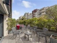 LUXURIOUSLY APPOINTED APARTMENT BORDERED BY TWO EAST AND WEST TERRACES