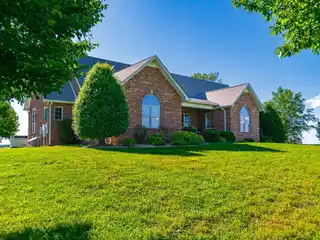 Updated Home with Gorgeous Hilltop Views on 33 Acres