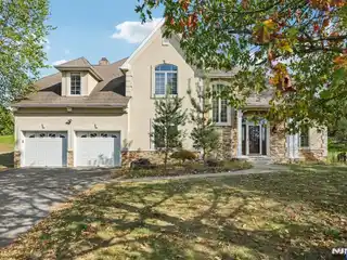 Beautifully Maintained Colonial Home on a Large Lot