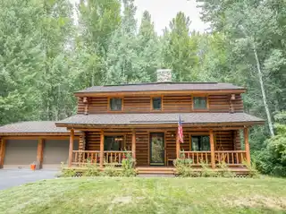 Elegant Log Home Along the Bigwood River
