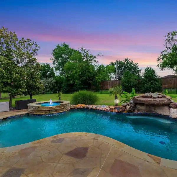 IMPECCABLE MAINTAINED HOME ON A LUSH ACRE