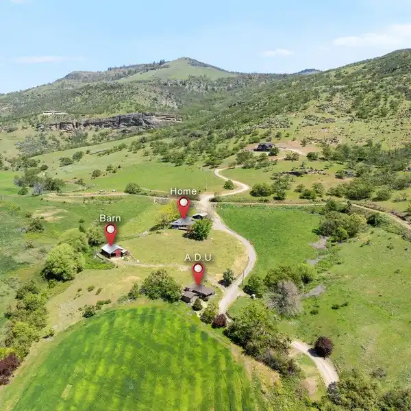 58-PLUS ACRES WITH TWO HOMES