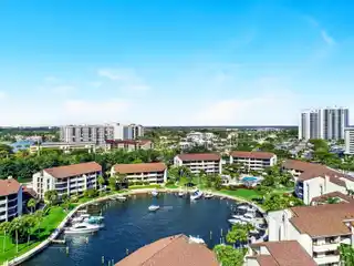 Stunning End Unit with Boat Slip in Private Marina