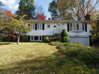 Charming Ranch Home with Stone Fireplace and Updated Kitchen