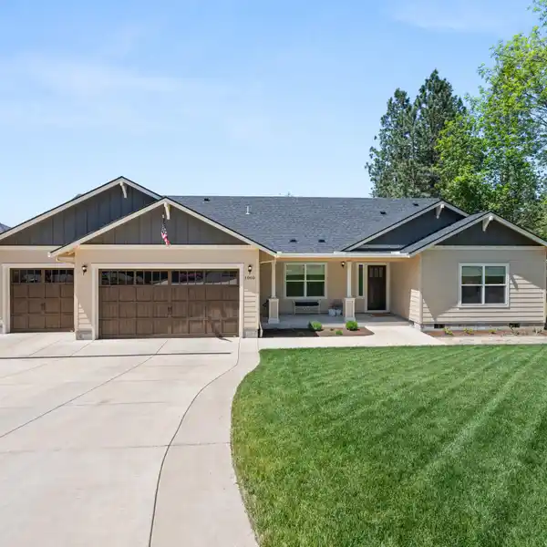 IMMACULATE HOME WITH BEAUTIFUL ROGUE RIVER FRONTAGE