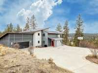 MODERN INDUSTRIAL CUSTOM HOME ON TWO ACRES