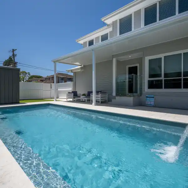 CONTEMPORARY HOME IN PRIME BEACHFRONT SETTING