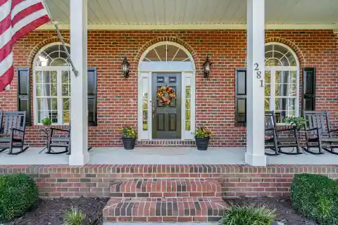 Elegant Waterfront Living Brick Ranch