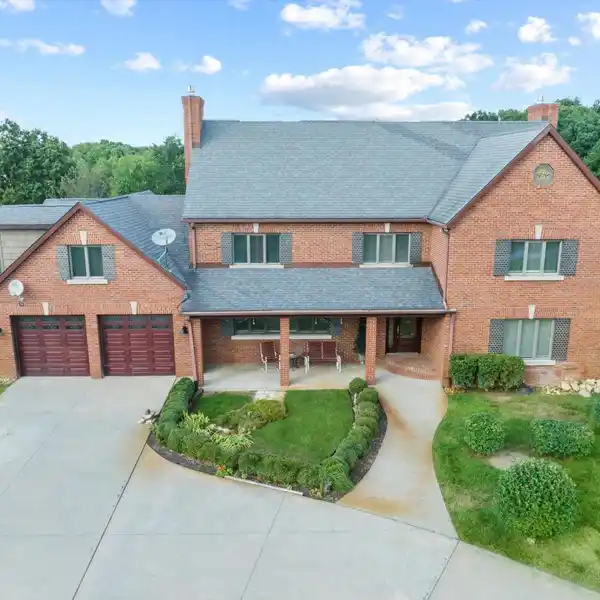 ALL-BRICK HOME ON OVER 50 ACRES