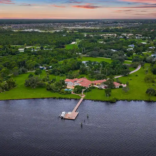 MAGNIFICENT RIVERFRONT ESTATE WITH 135-FOOT PRIVATE DOCK