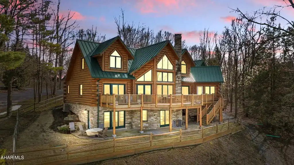 Stunning Custom Log Home Overlooking Indian Lake
