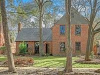 ARCHITECTURALLY SIGNIFICANT BRICK ENGLISH COTTAGE