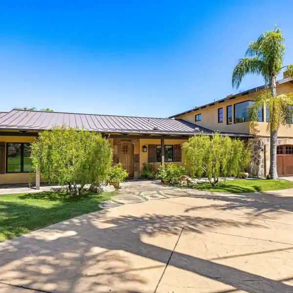 CUSTOM-BUILT SPANISH CONTEMPORARY ESTATE ON A PRIVATE ACRE