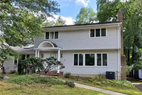 Well-Kept Center Hall Colonial Situated in a Prime Location