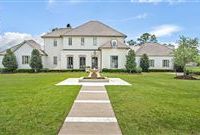 REMARKABLE HOME SITUATED ON AN EXPANSIVE GOLF COURSE LOT 