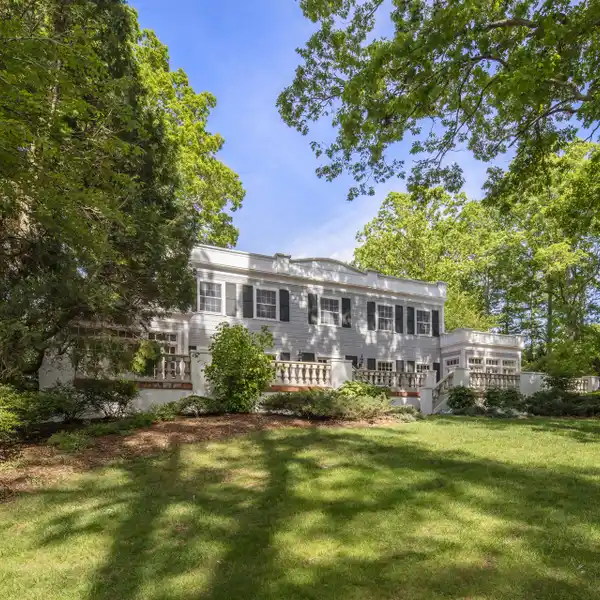 ELEGANT ITALIANATE HOME ON TWO SERENE ACRES