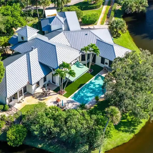 STUNNING LAKE VIEWS ON 3 SIDES & BEAUTIFULLY LANDSCAPED