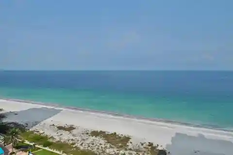 Turnkey Beachfront Condo with Designer Finishes