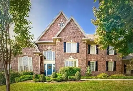 EXQUISITE ALL-BRICK HOME WITH OUTDOOR OASIS