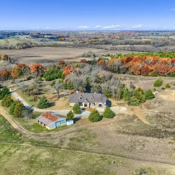 WELL-APPOINTED CUSTOM HOME IN A PRIVATE SETTING