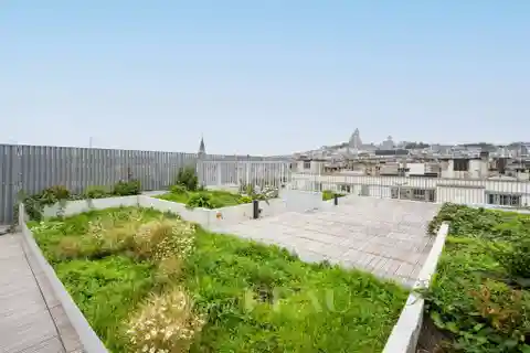 Panoramic Rooftop Living with Sacré-Cœur Views