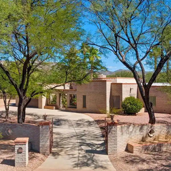 STUNNING CUSTOM MASONRY HOME ON A QUIET CUL-DE-SAC