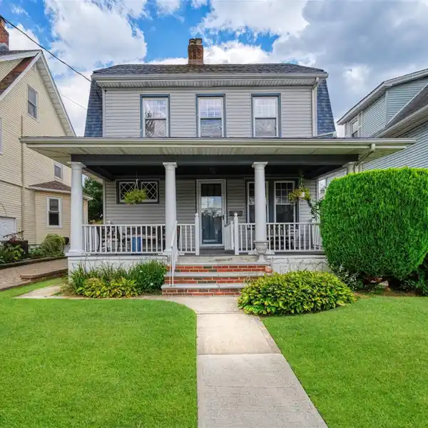 CHARMING DUTCH COLONIAL REVIVAL HOME