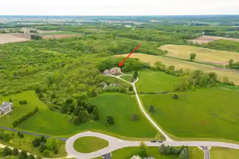 Versatile Estate on Private Acreage with Views