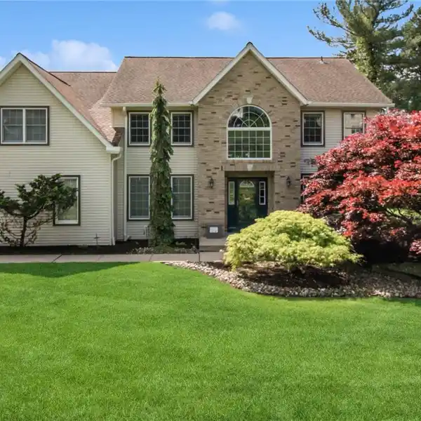STANDOUT CENTER HALL COLONIAL