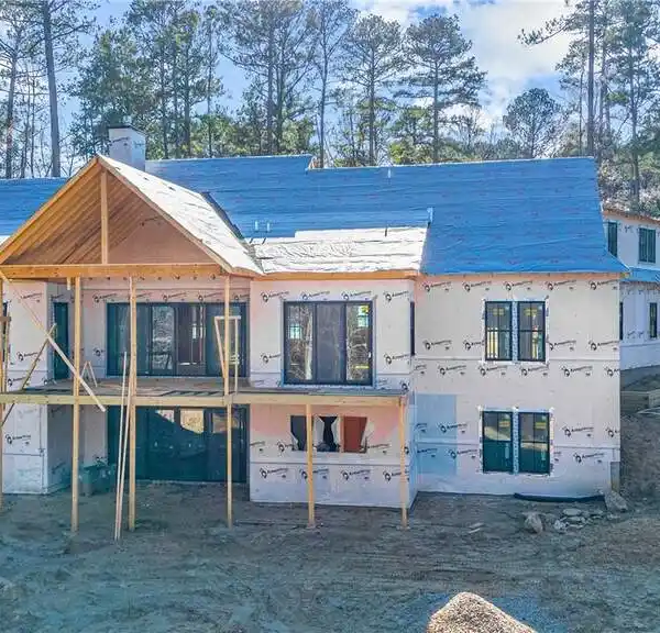 NEW CONSTRUCTION IN A WOODED SETTING