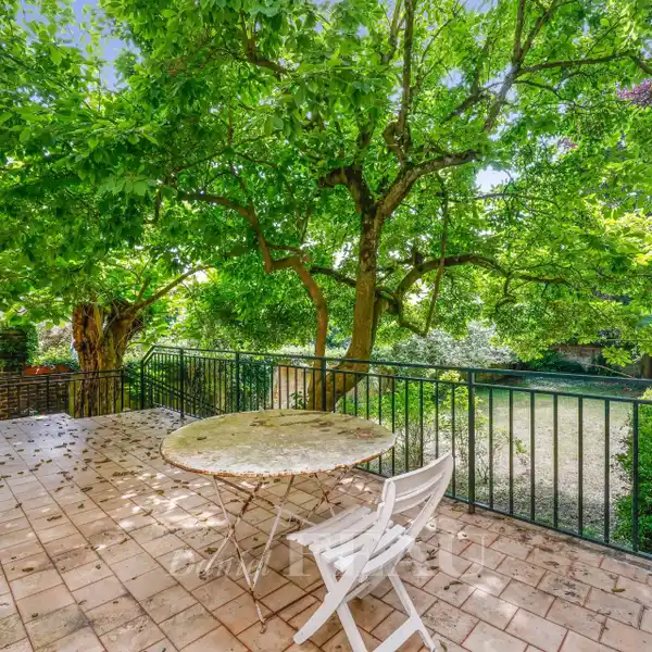 QUAINT HOME WITH ATTACHED BACKYARD