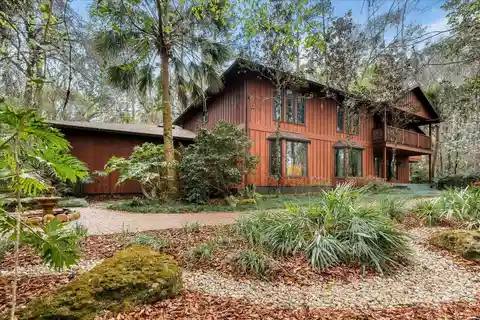 Custom Home on over 2.5 Acres in Shands Woods