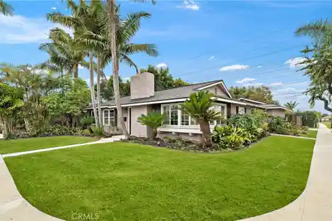Single-Level Stunner with Tropical Backyard Oasis