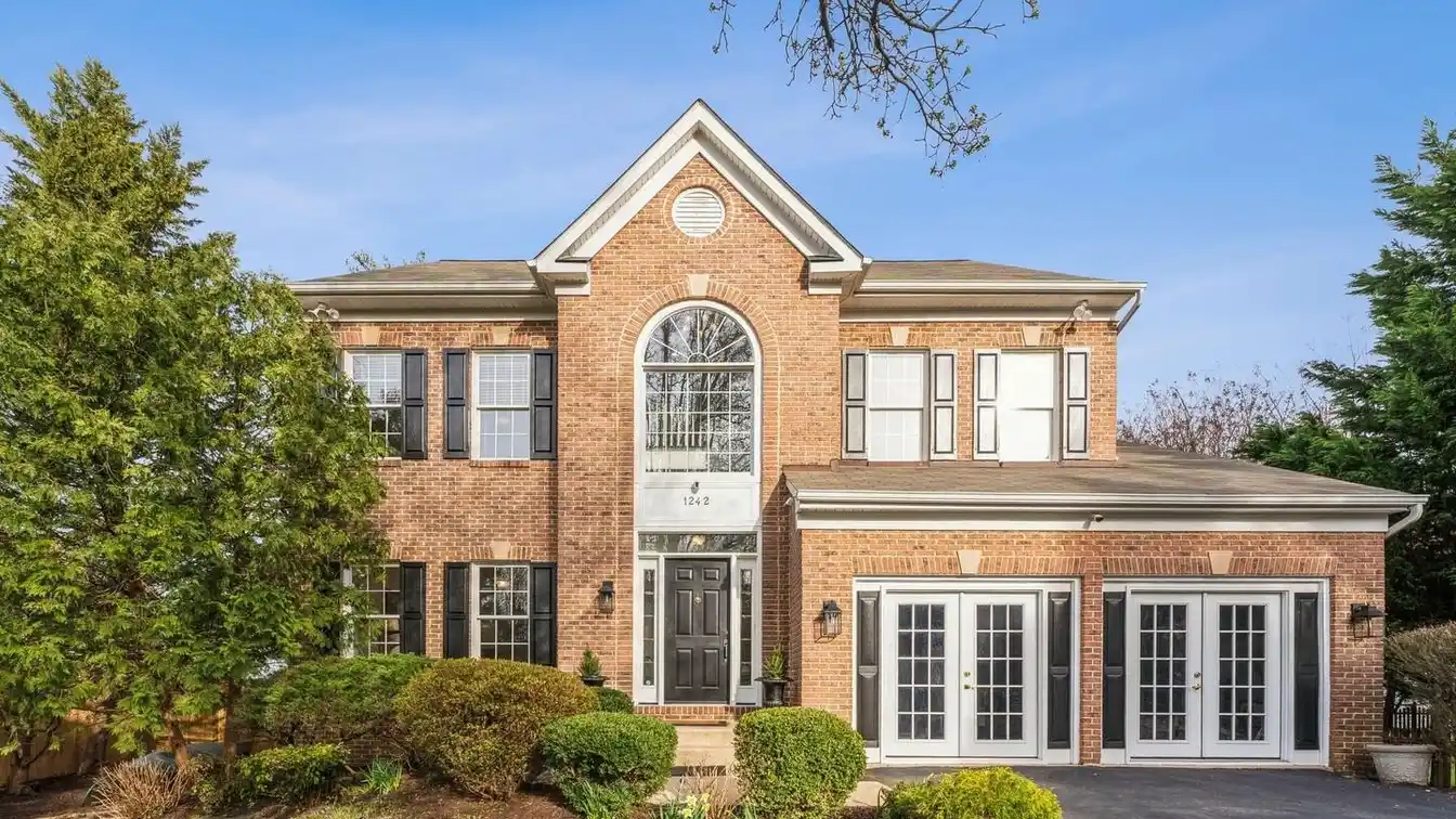 Luxe Brick Colonial with Backyard Paradise