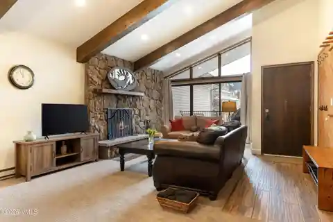 Top-Floor Residence Blending Comfort and Versatility